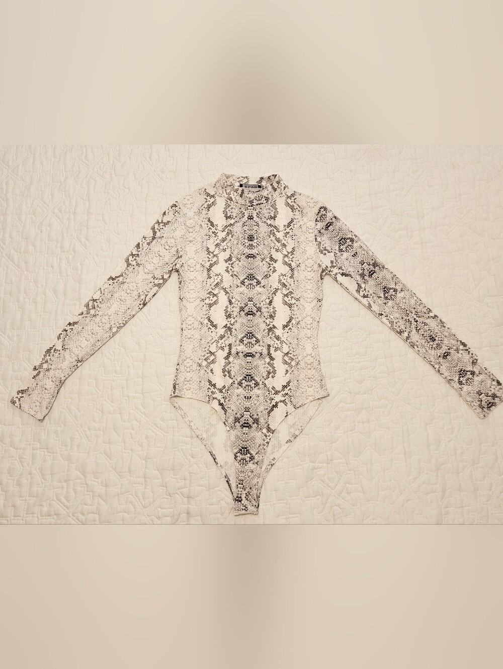 BLVD Cream and Black Snake-Print Long Sleeve Bodysuit